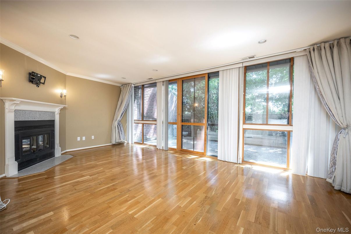 Empty room, Fireplace, Interior, Recessed Lighting, Wood Texture Flooring