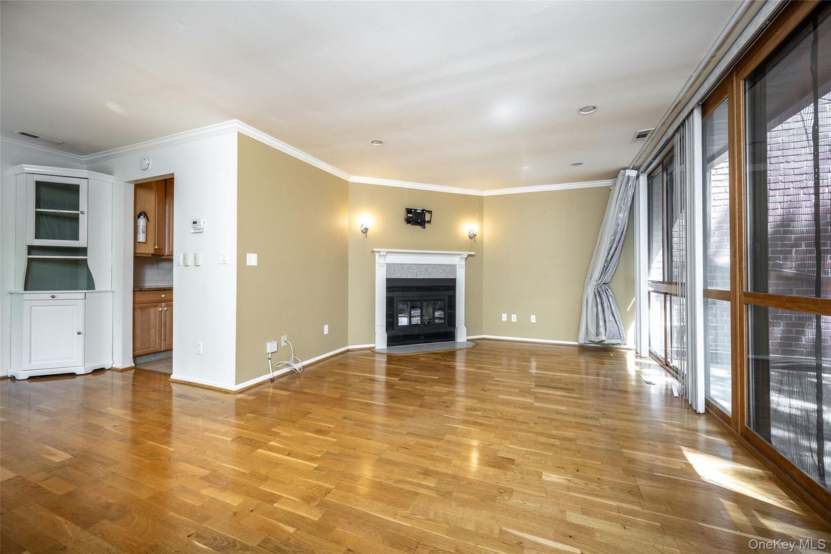 Empty room, Fireplace, Interior, Recessed Lighting, Wood Texture Flooring