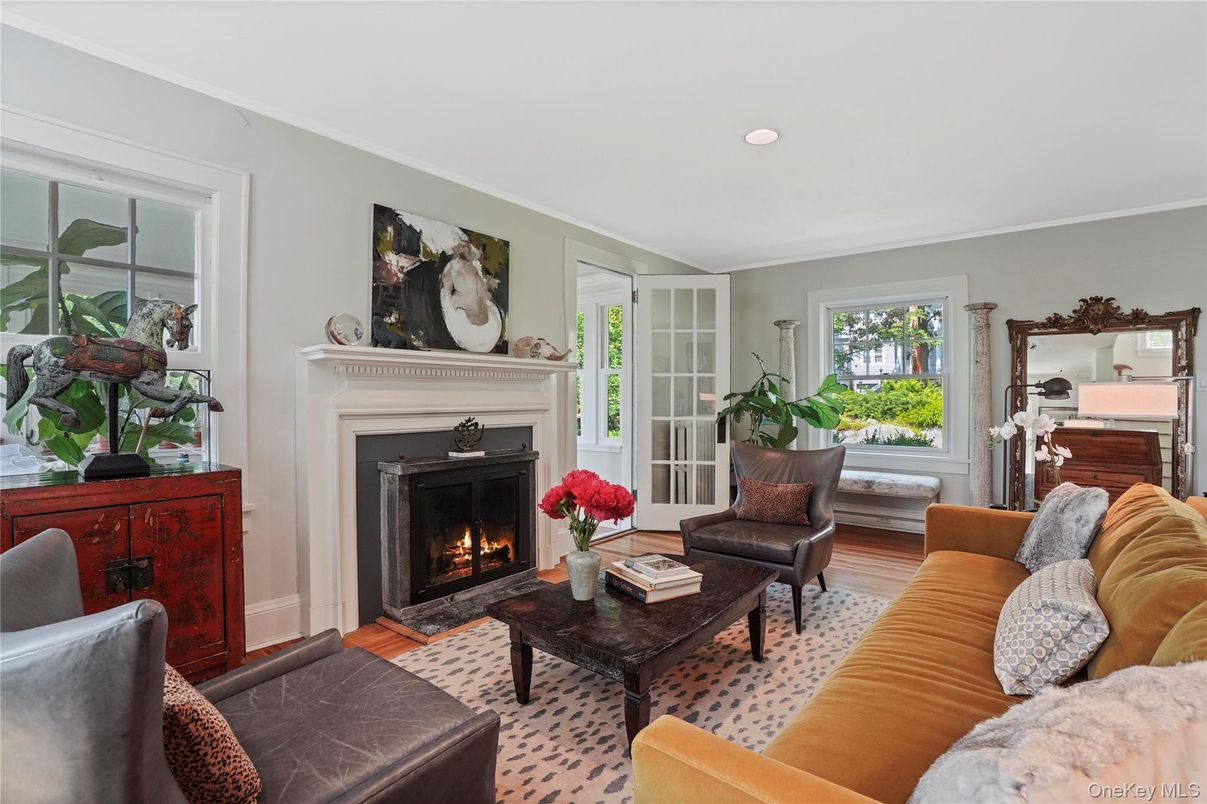 Fireplace, Interior, Living room, Piano, Recessed Lighting, Wood Texture Flooring