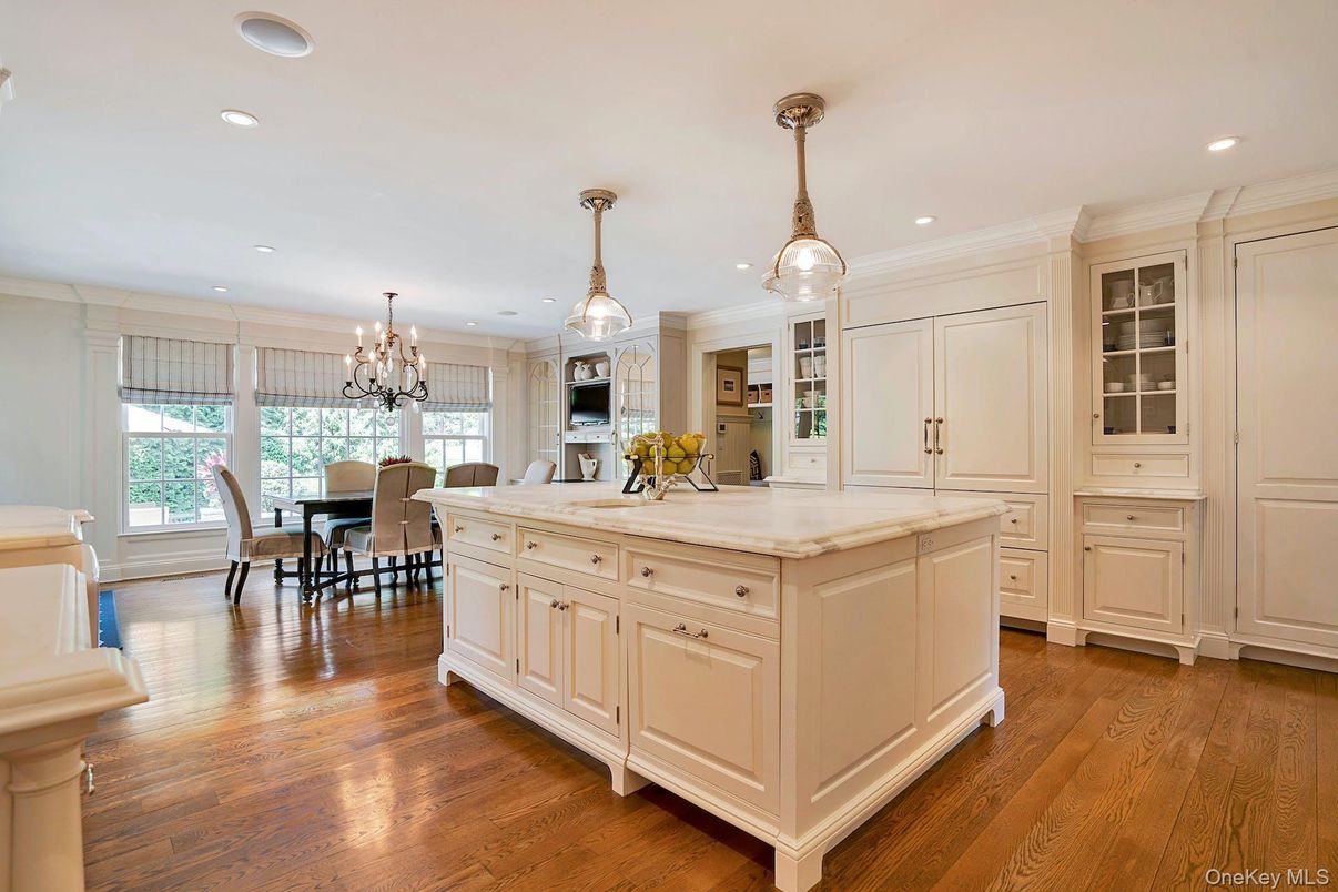 Chandelier, Dining room, Fireplace, Interior, Kitchen, Recessed Lighting, Wood Texture Flooring