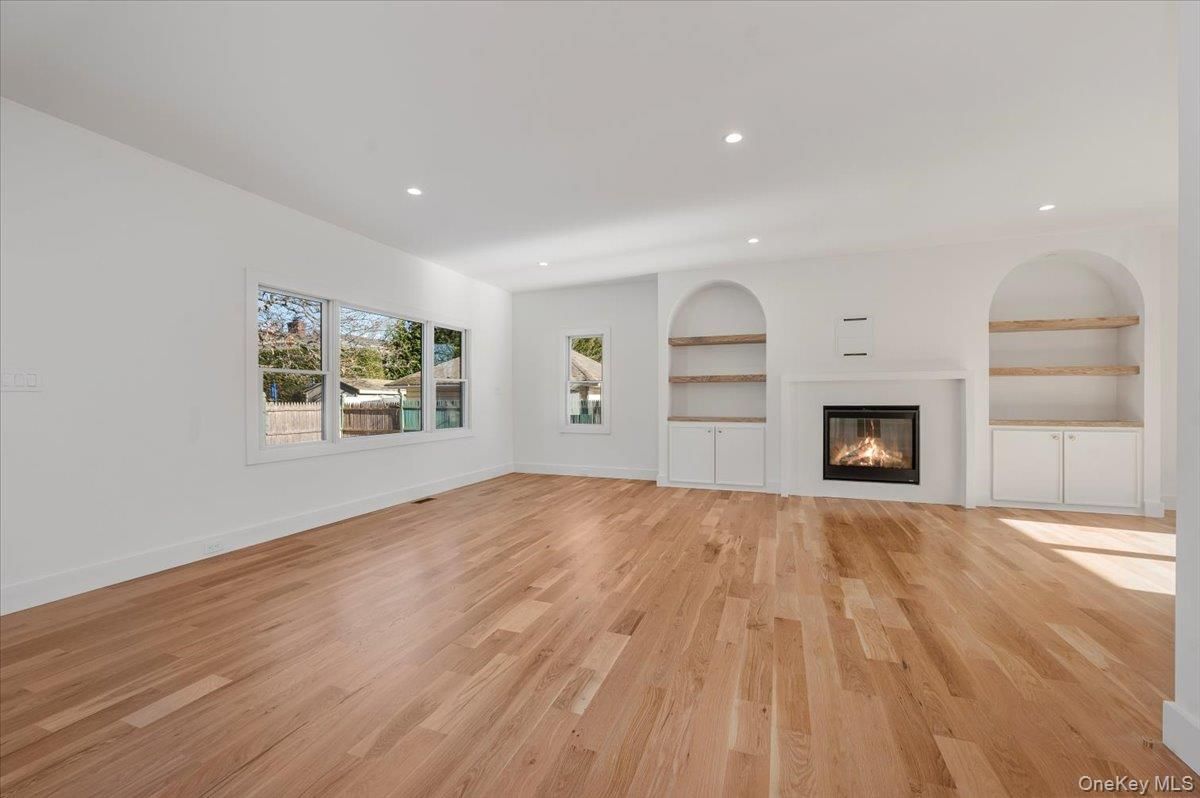 Empty room, Fireplace, Interior, Recessed Lighting, Wood Texture Flooring
