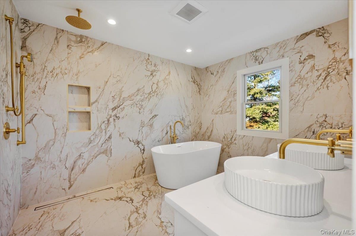 Bathroom, Dual Sink Vanities, Free Standing Baths, Interior, Marble, Marble Walls, Recessed Lighting