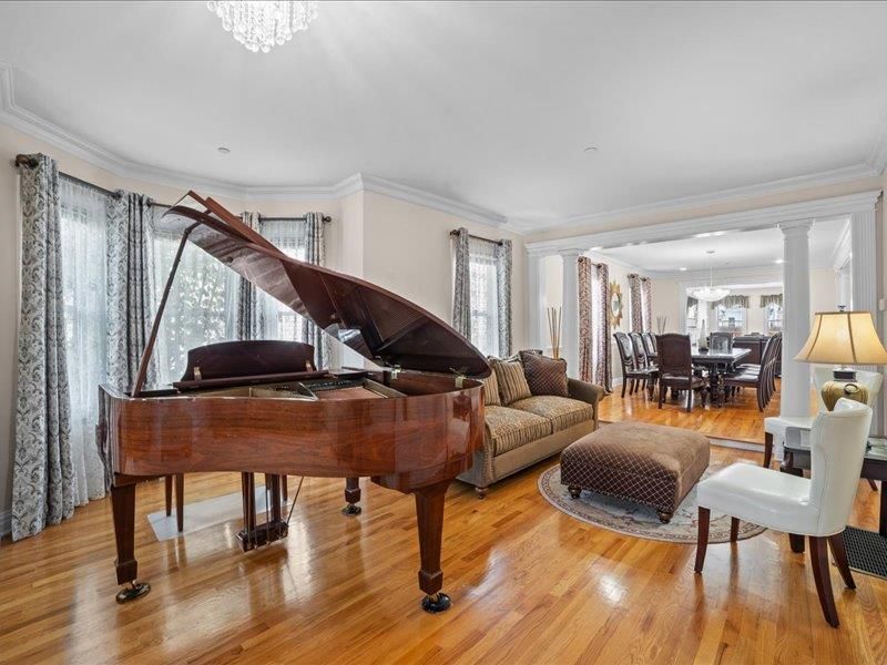 Dining room, Interior, Living room, Pendant Lights, Piano, Recessed Lighting, Wood Texture Flooring