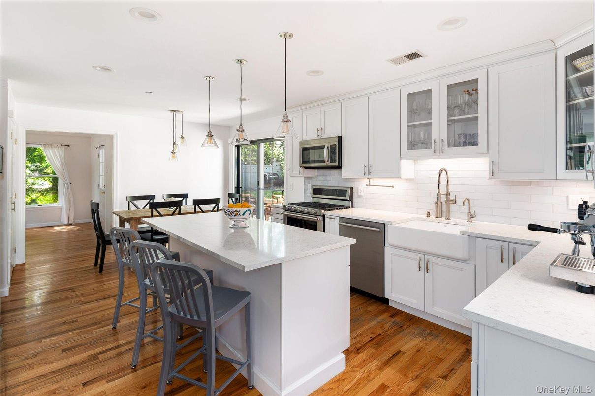 Dining room, Interior, Kitchen, Pendant Lights, Recessed Lighting, Stainless Steel Appliances, Wood Texture Flooring