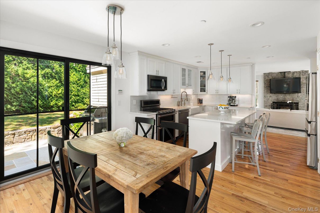 Dining room, Fireplace, Interior, Kitchen, Pendant Lights, Recessed Lighting, Wood Texture Flooring