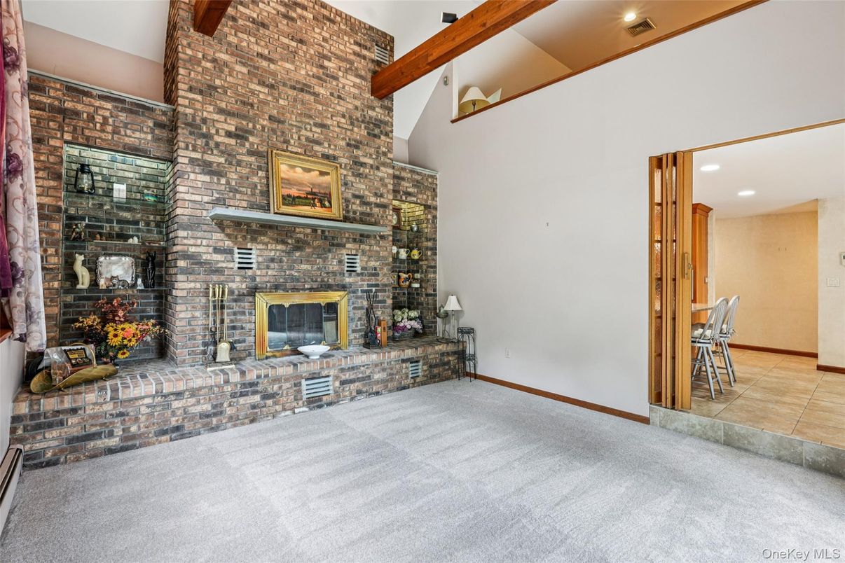 Empty room, Fireplace, Interior, Recessed Lighting, Stone Walls, Wooden Beams