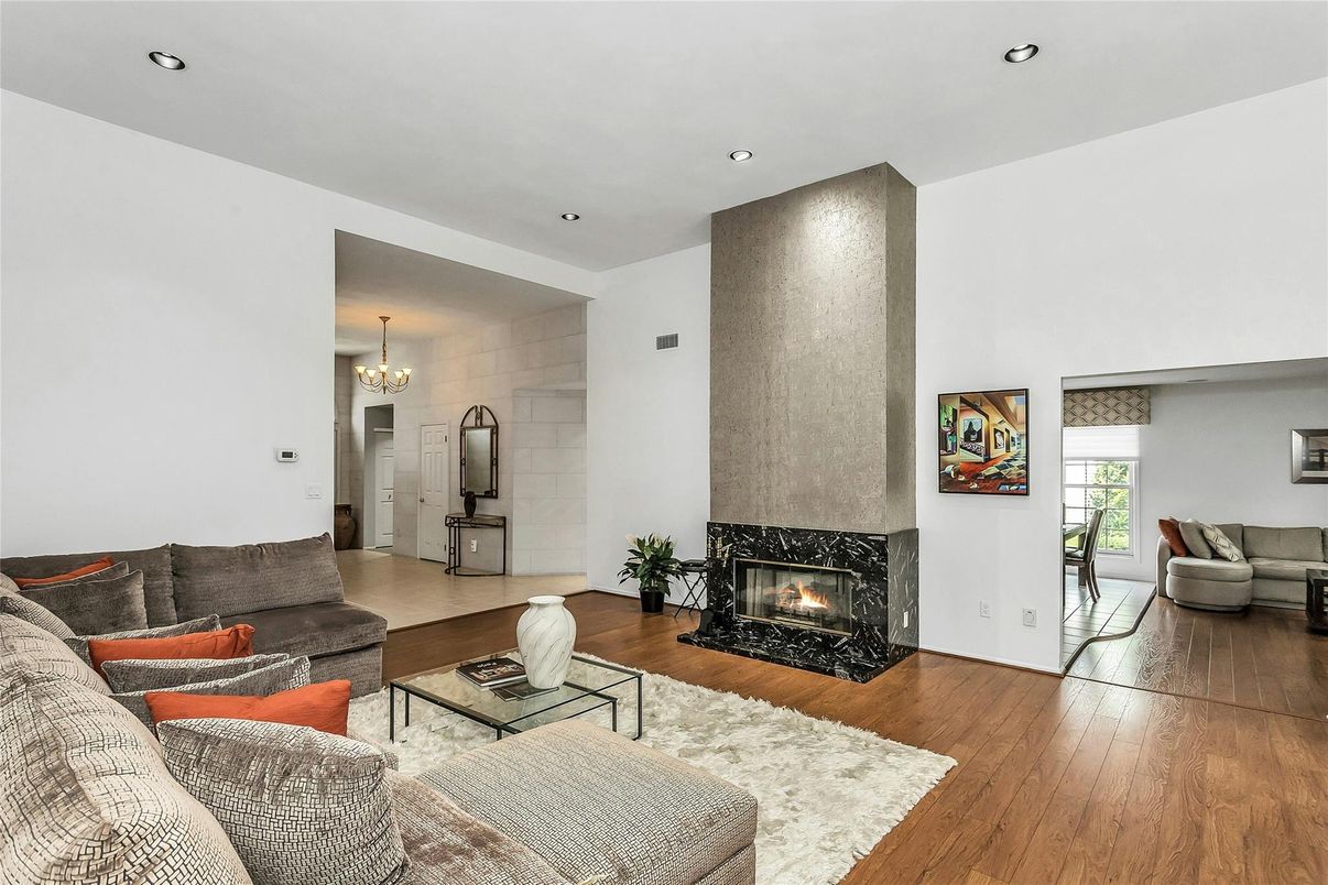 Chandelier, Fireplace, Interior, Living room, Recessed Lighting, Wood Texture Flooring