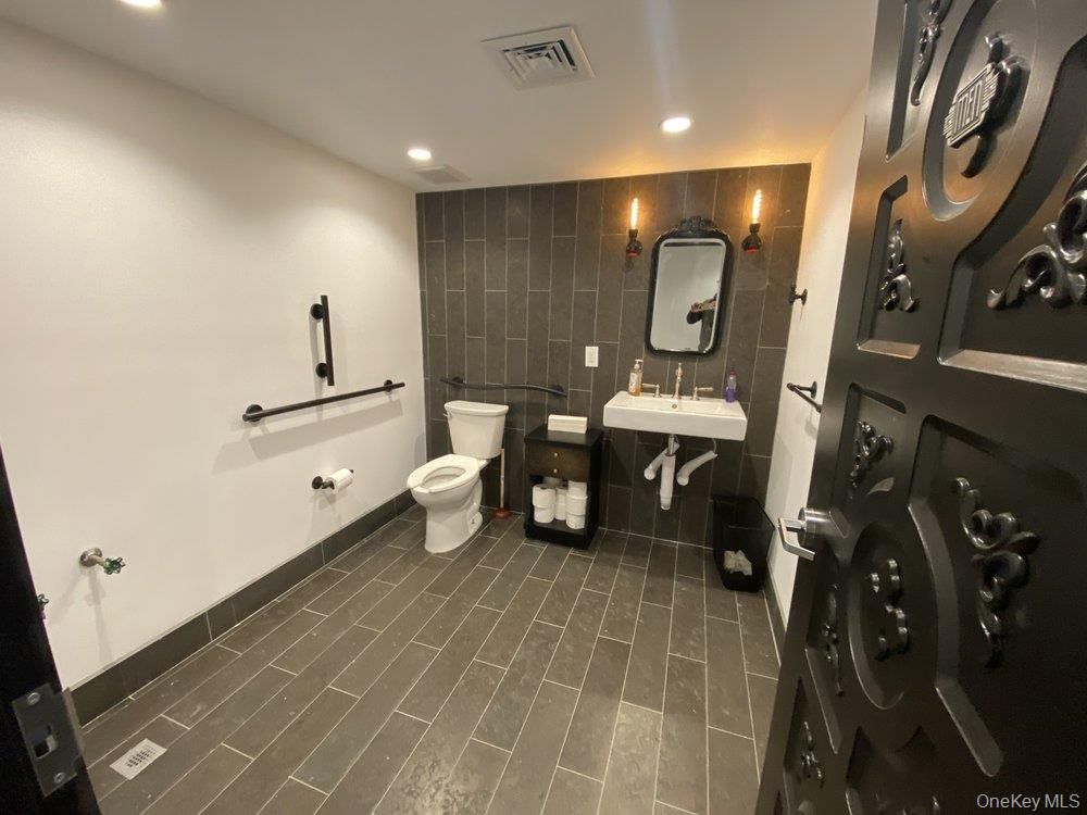 Bathroom, Dual Sink Vanities, Interior, Recessed Lighting, Wood Texture Flooring