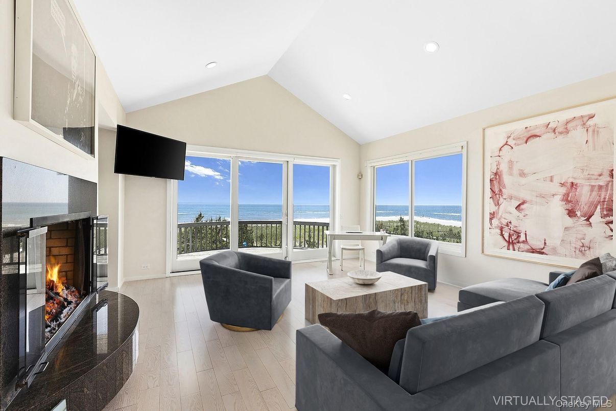 Fireplace, Interior, Living room, Recessed Lighting, Water, Wood Texture Flooring