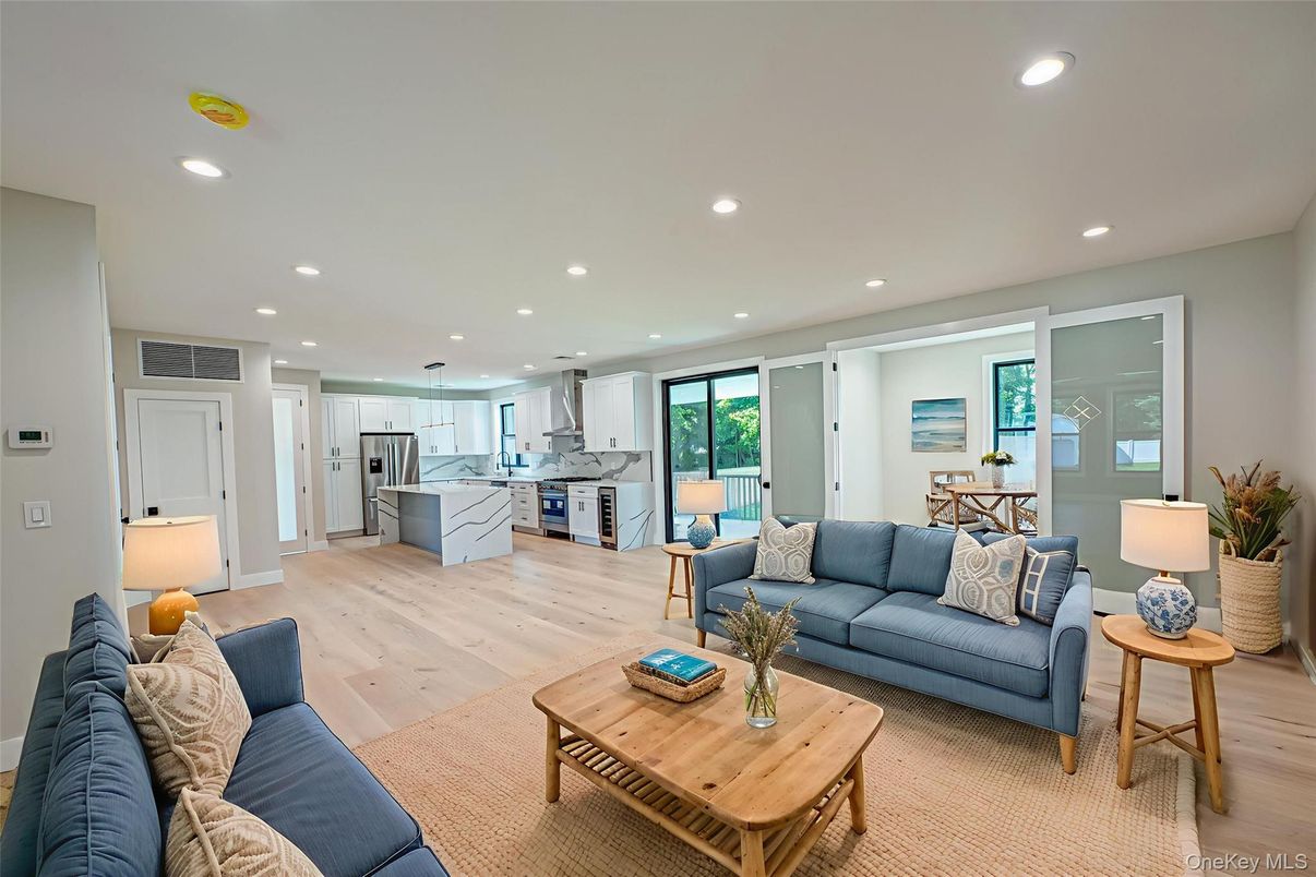 Dining room, Interior, Kitchen, Living room, Pendant Lights, Recessed Lighting, Stainless Steel Appliances, Wood Texture Flooring