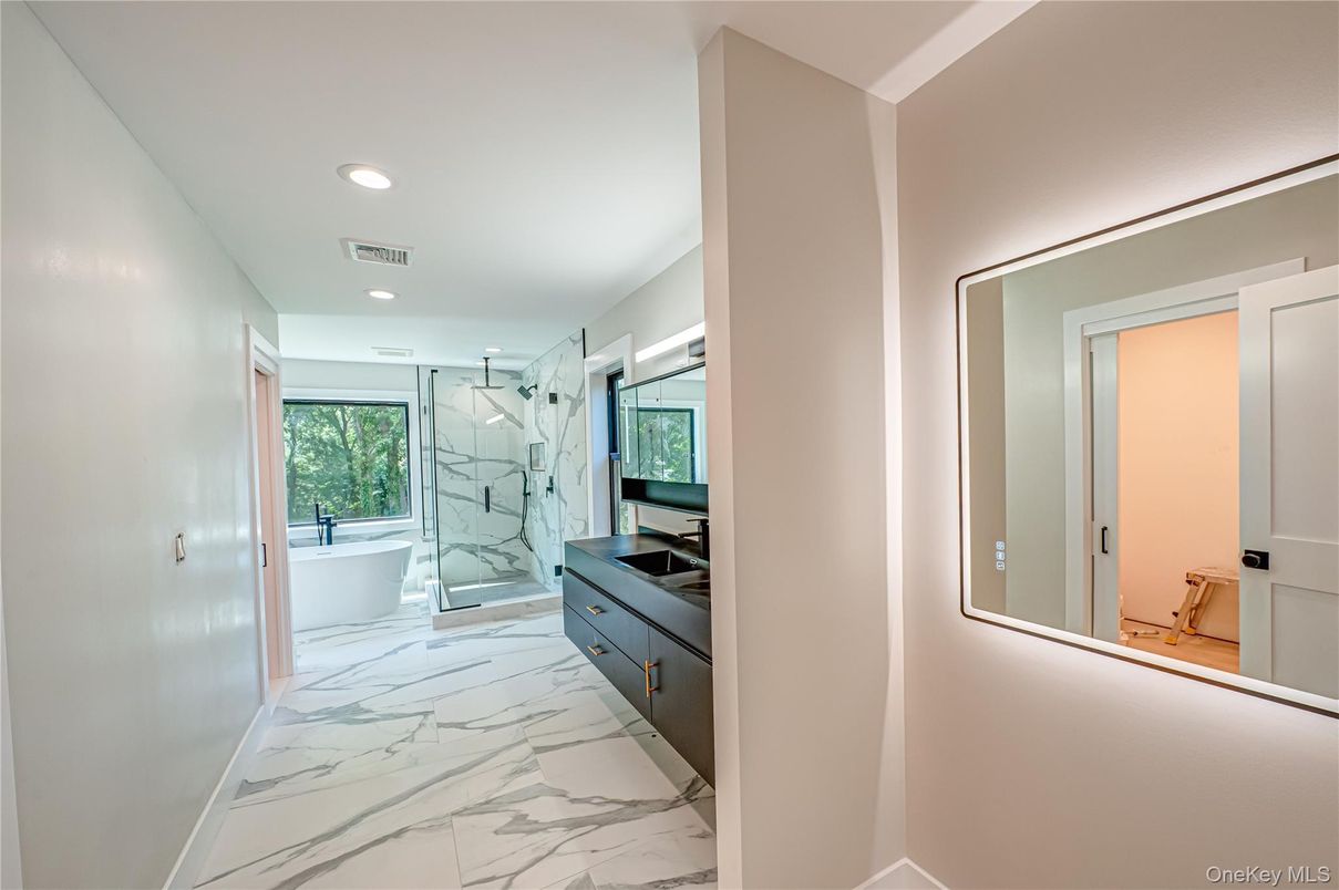 Bathroom, Free Standing Baths, Glass Shower, Interior, Marble, Marble Walls, Recessed Lighting