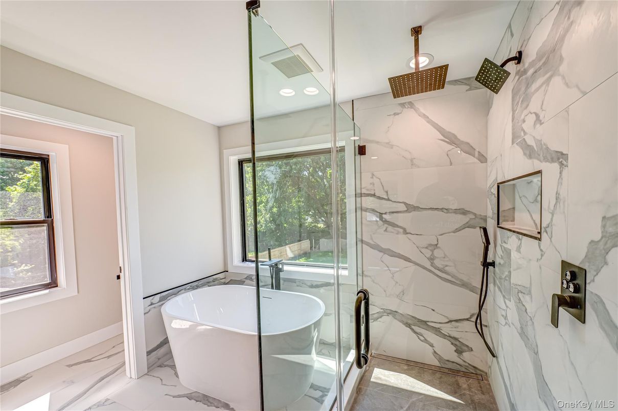 Bathroom, Free Standing Baths, Glass Shower, Interior, Marble, Marble Walls, Recessed Lighting