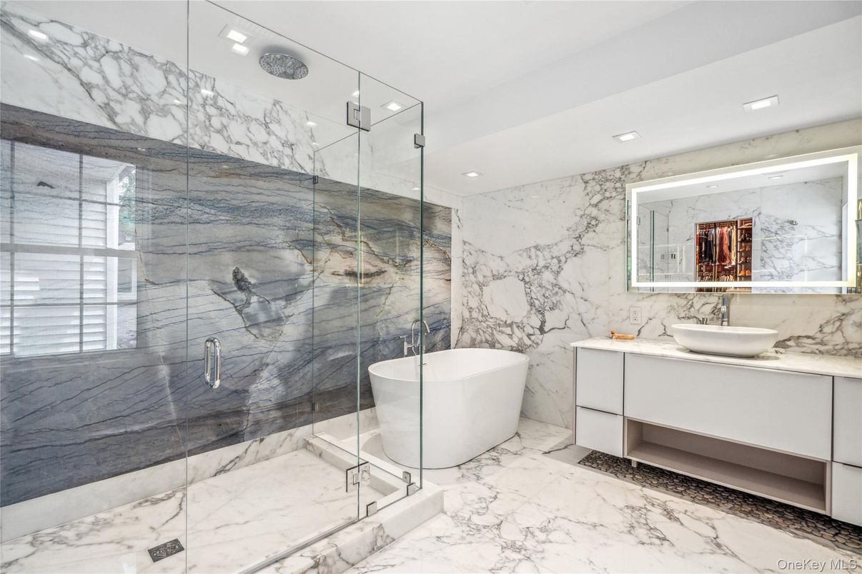 Bathroom, Dual Sink Vanities, Free Standing Baths, Glass Shower, Interior, Marble, Marble Walls, Recessed Lighting