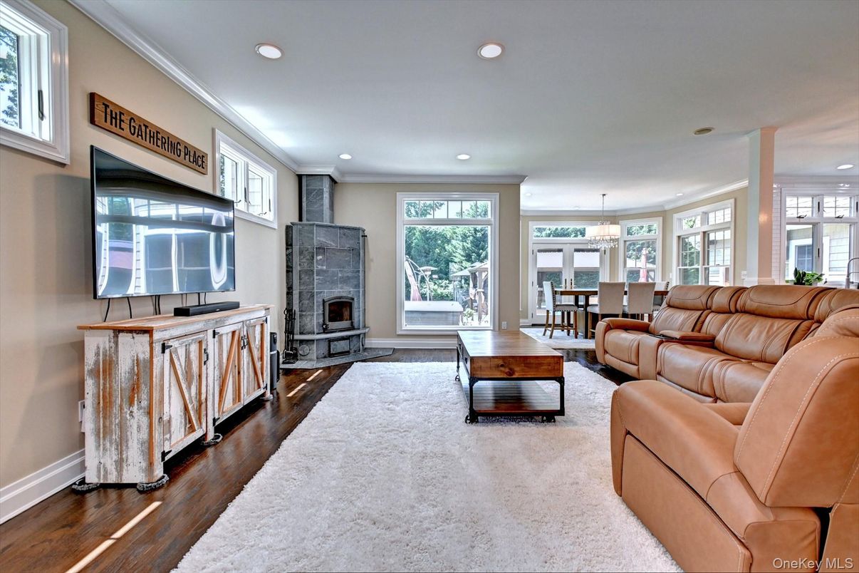 Chandelier, Dining room, Fireplace, Interior, Living room, Recessed Lighting, Wood Texture Flooring