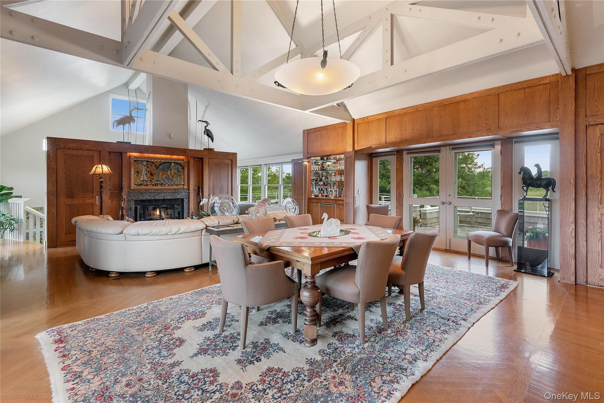 Dining room, Fireplace, Interior, Living room, Pendant Lights, Wood Texture Flooring, Wooden Walls