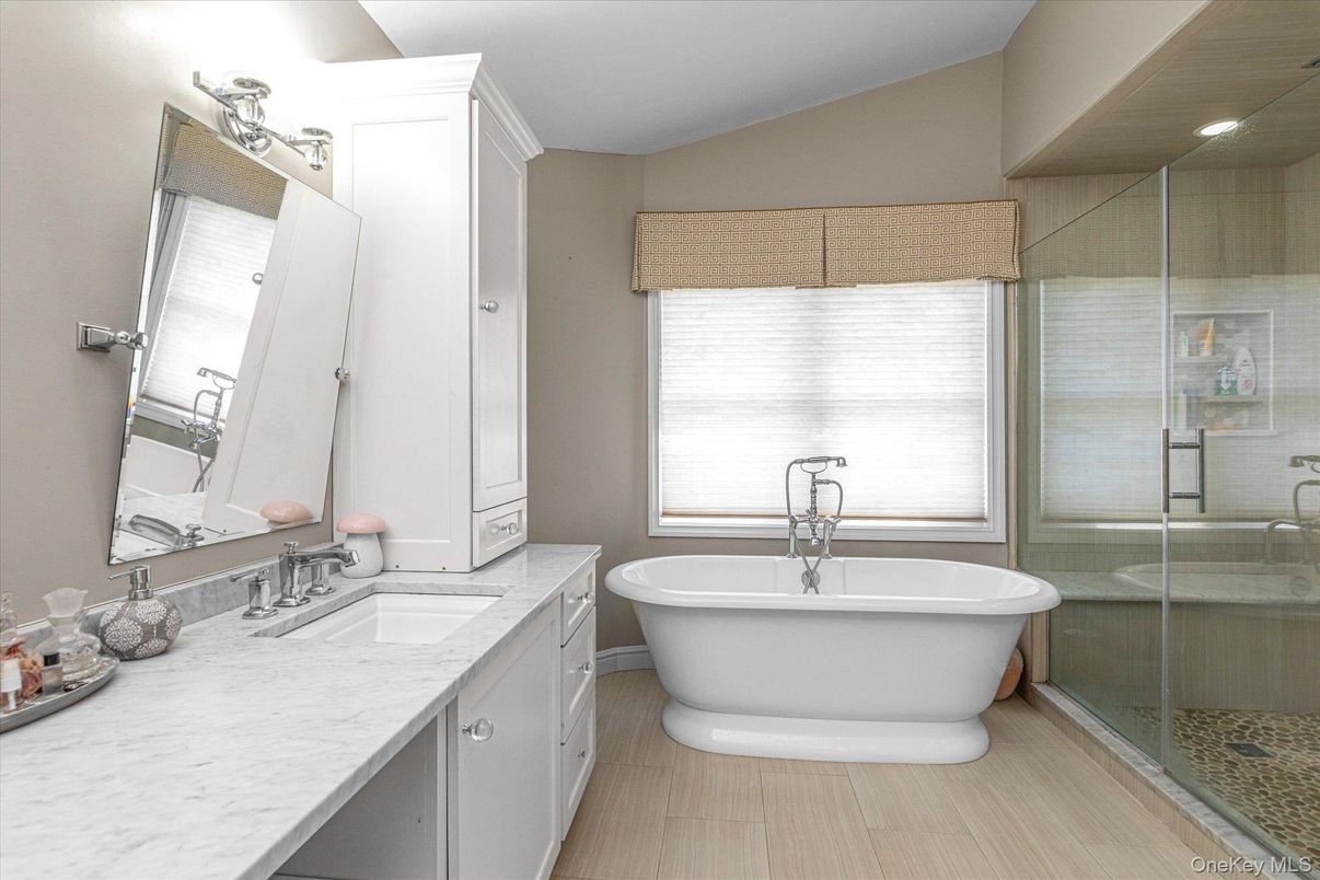 Bathroom, Dual Sink Vanities, Free Standing Baths, Glass Shower, Interior, Wood Texture Flooring