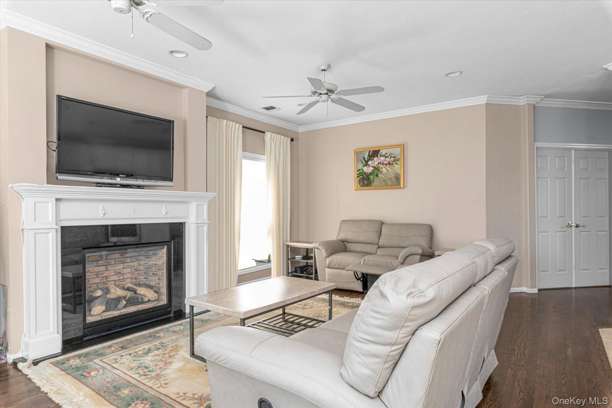 Fireplace, Interior, Living room, Recessed Lighting, Wood Texture Flooring