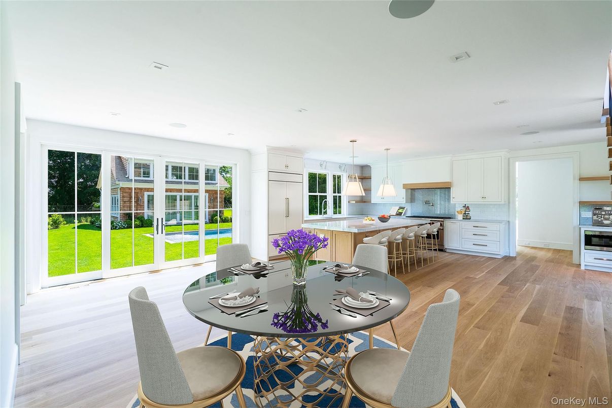 Dining room, Interior, Kitchen, Pendant Lights, Recessed Lighting, Stainless Steel Appliances, Wood Texture Flooring