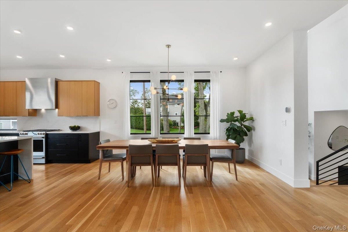 Dining room, Interior, Kitchen, Pendant Lights, Recessed Lighting, Stainless Steel Appliances, Wood Texture Flooring