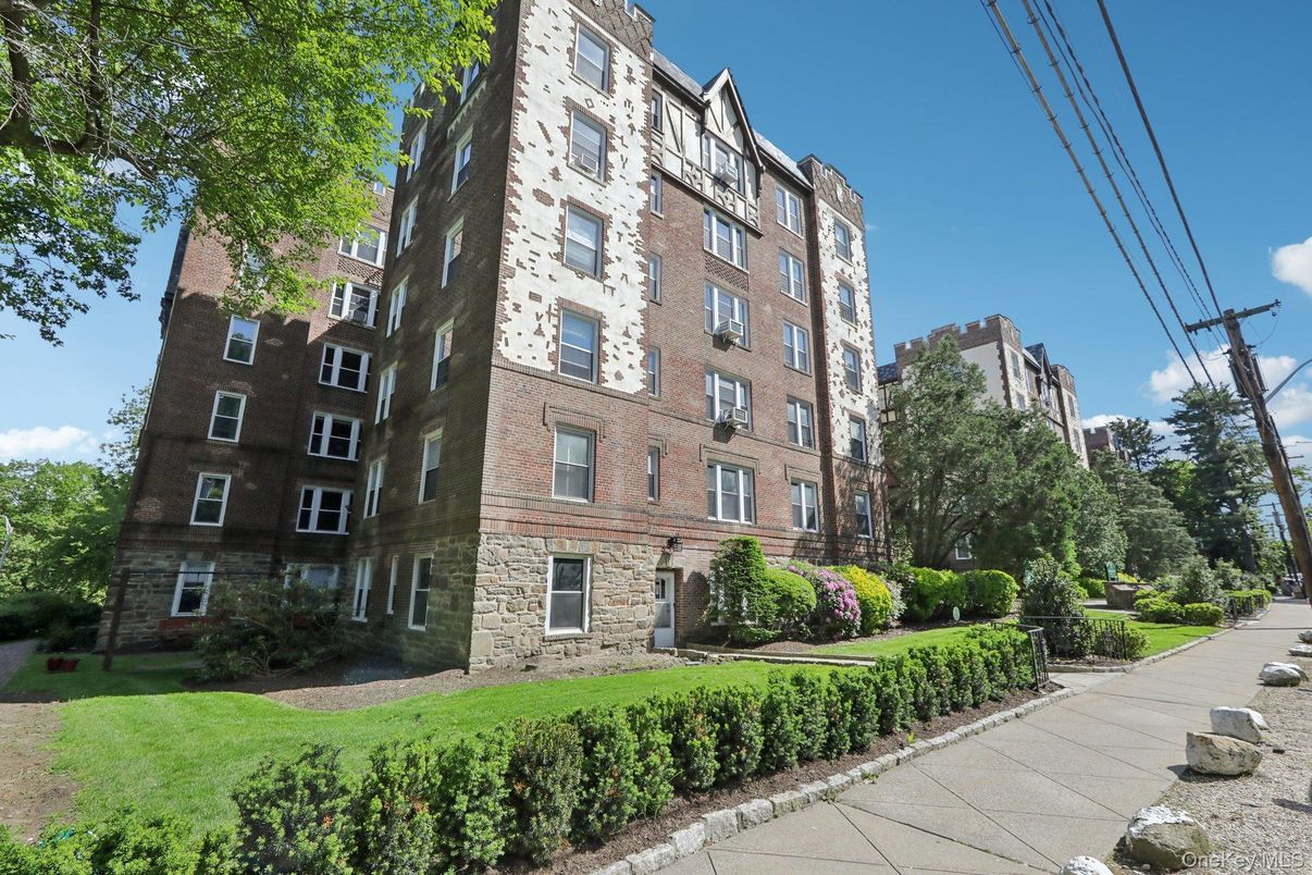 Exterior, Facade, Brick Facade, Condo Building