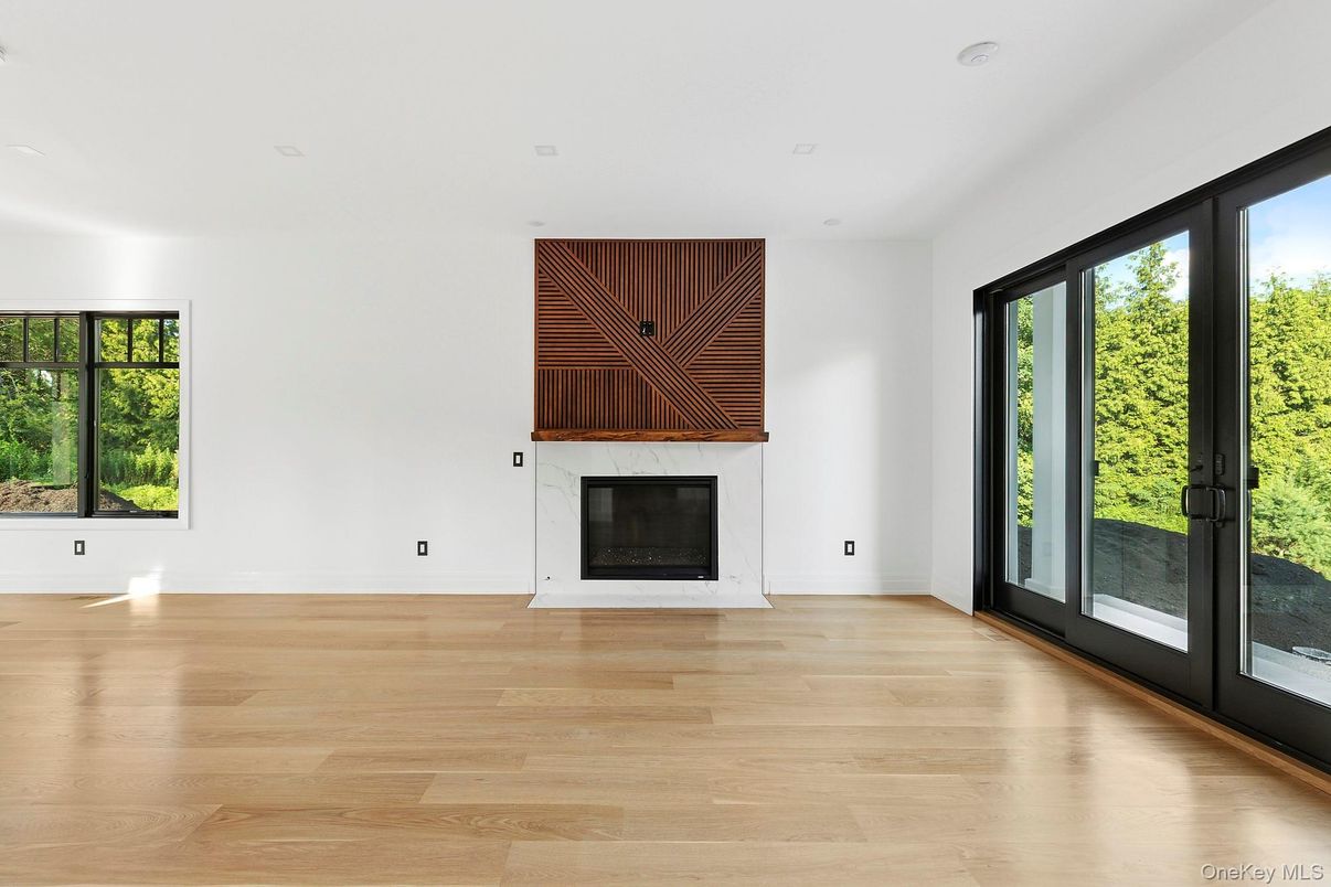Empty room, Fireplace, Interior, Recessed Lighting, Wood Texture Flooring