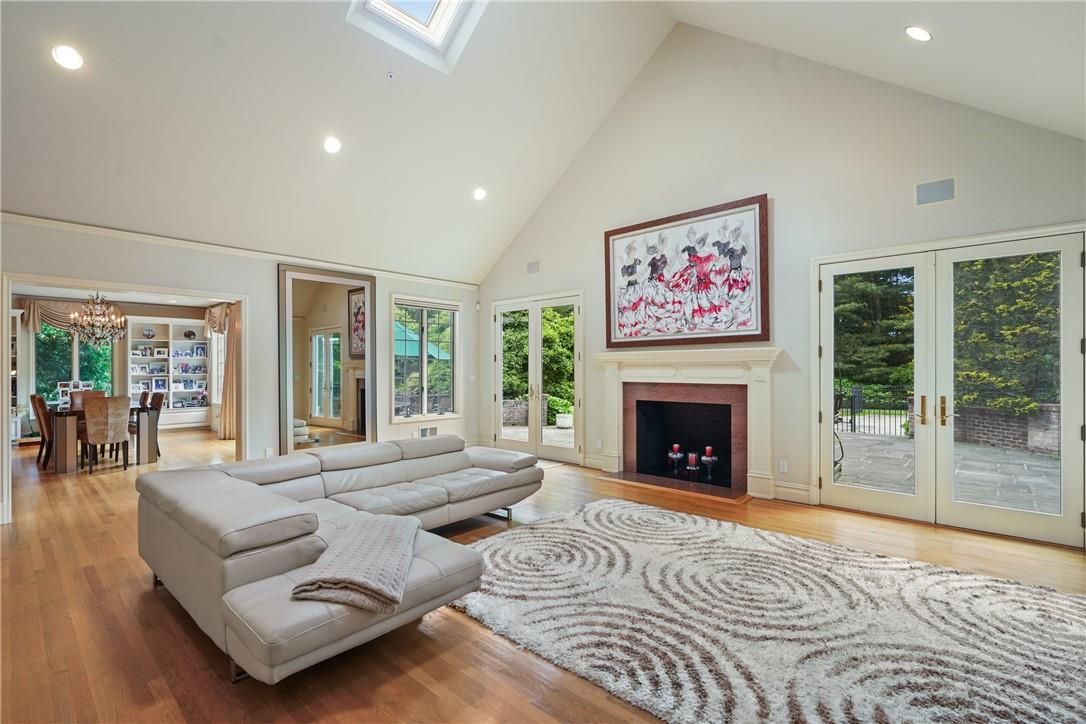 Chandelier, Dining room, Fireplace, Interior, Living room, Recessed Lighting, Wood Texture Flooring