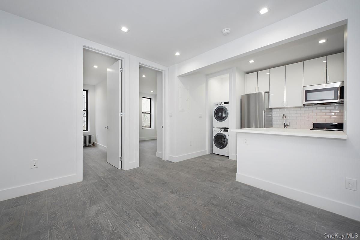 Interior, Kitchen, Recessed Lighting, Stainless Steel Appliances, Washer, Wood Texture Flooring