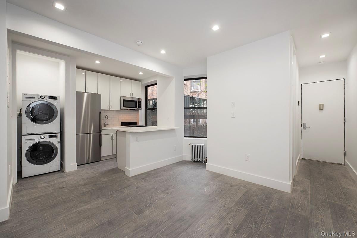 Interior, Kitchen, Recessed Lighting, Stainless Steel Appliances, Utility Closets, Washer, Wood Texture Flooring