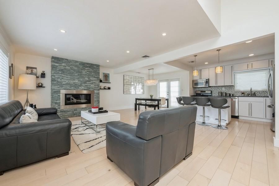 Chandelier, Dining room, Fireplace, Interior, Kitchen, Living room, Pendant Lights, Recessed Lighting, Stone Walls, Wood Texture Flooring