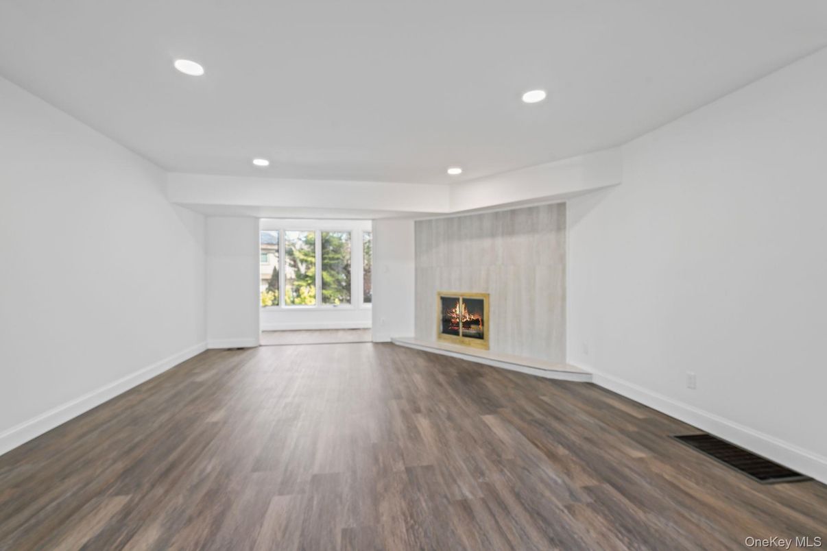 Empty room, Fireplace, Interior, Recessed Lighting, Wood Texture Flooring