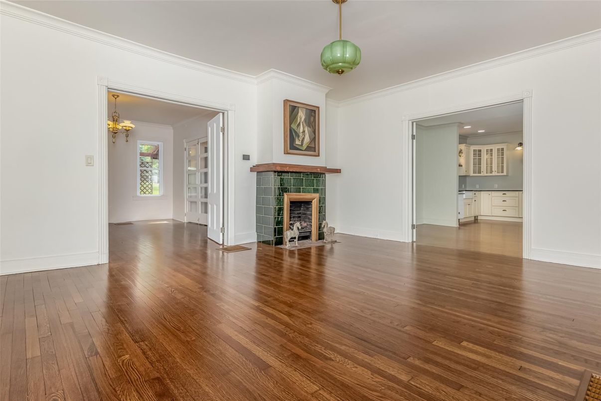 Empty room, Fireplace, Interior, Pendant Lights, Recessed Lighting, Wood Texture Flooring