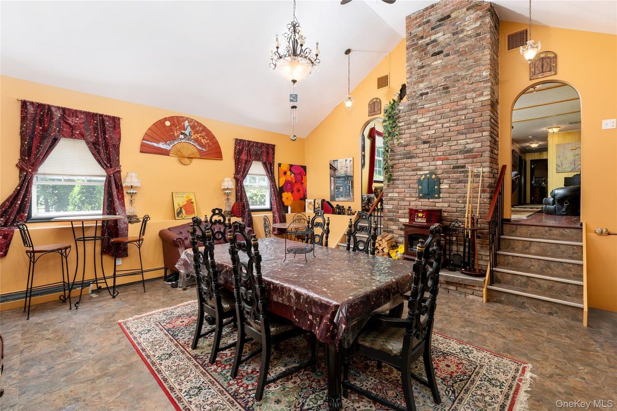 Dining room, Fireplace, Interior, Pendant Lights, Stone Walls