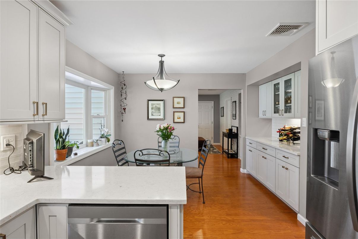 Dining room, Interior, Kitchen, Pendant Lights, Stainless Steel Appliances, Wood Texture Flooring
