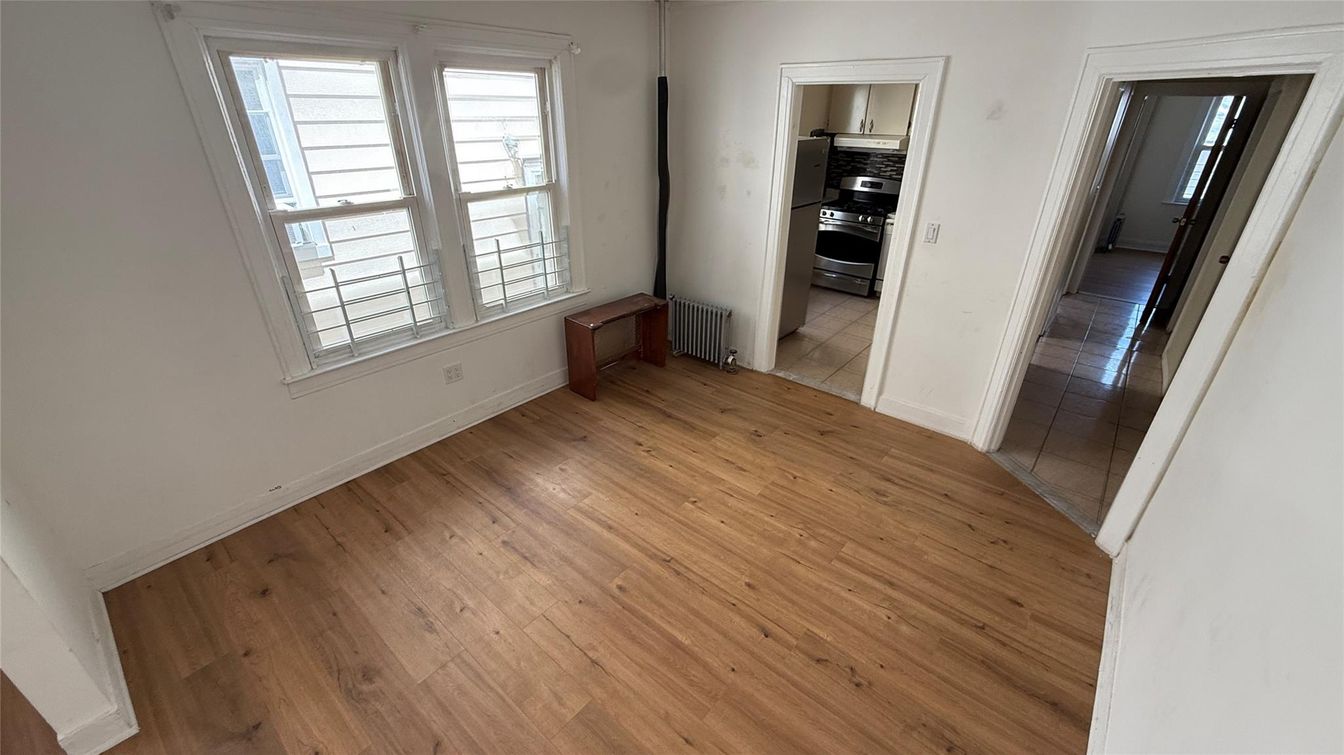 Empty room, Interior, Kitchen, Stainless Steel Appliances, Wood Texture Flooring