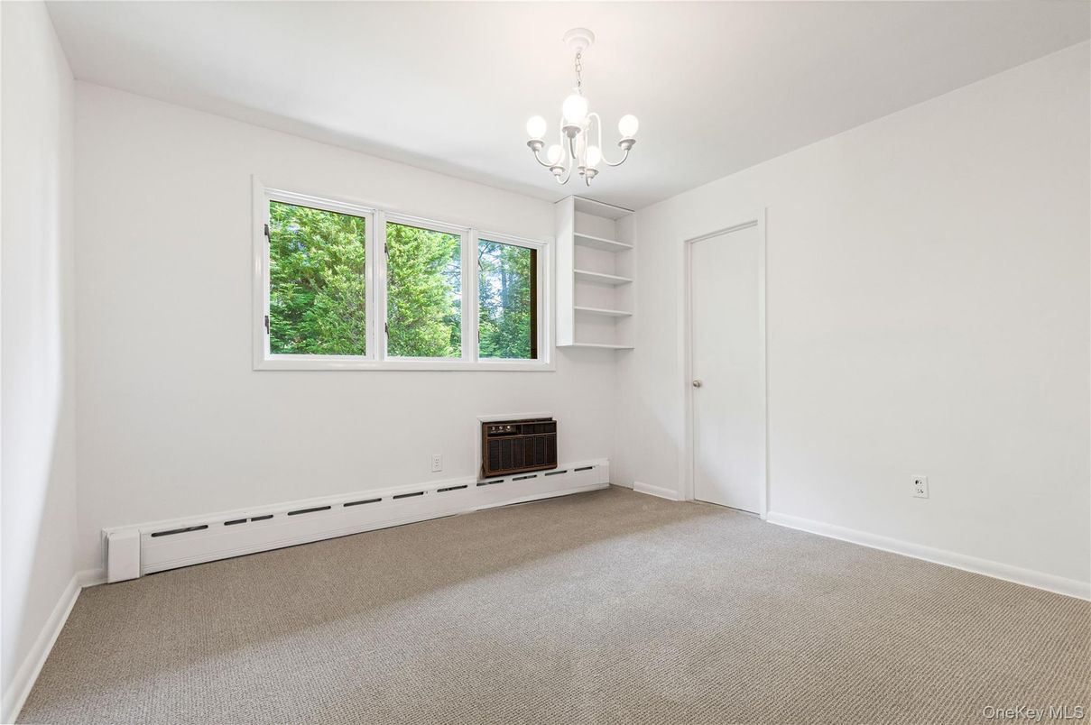 Chandelier, Empty room, Fireplace, Interior