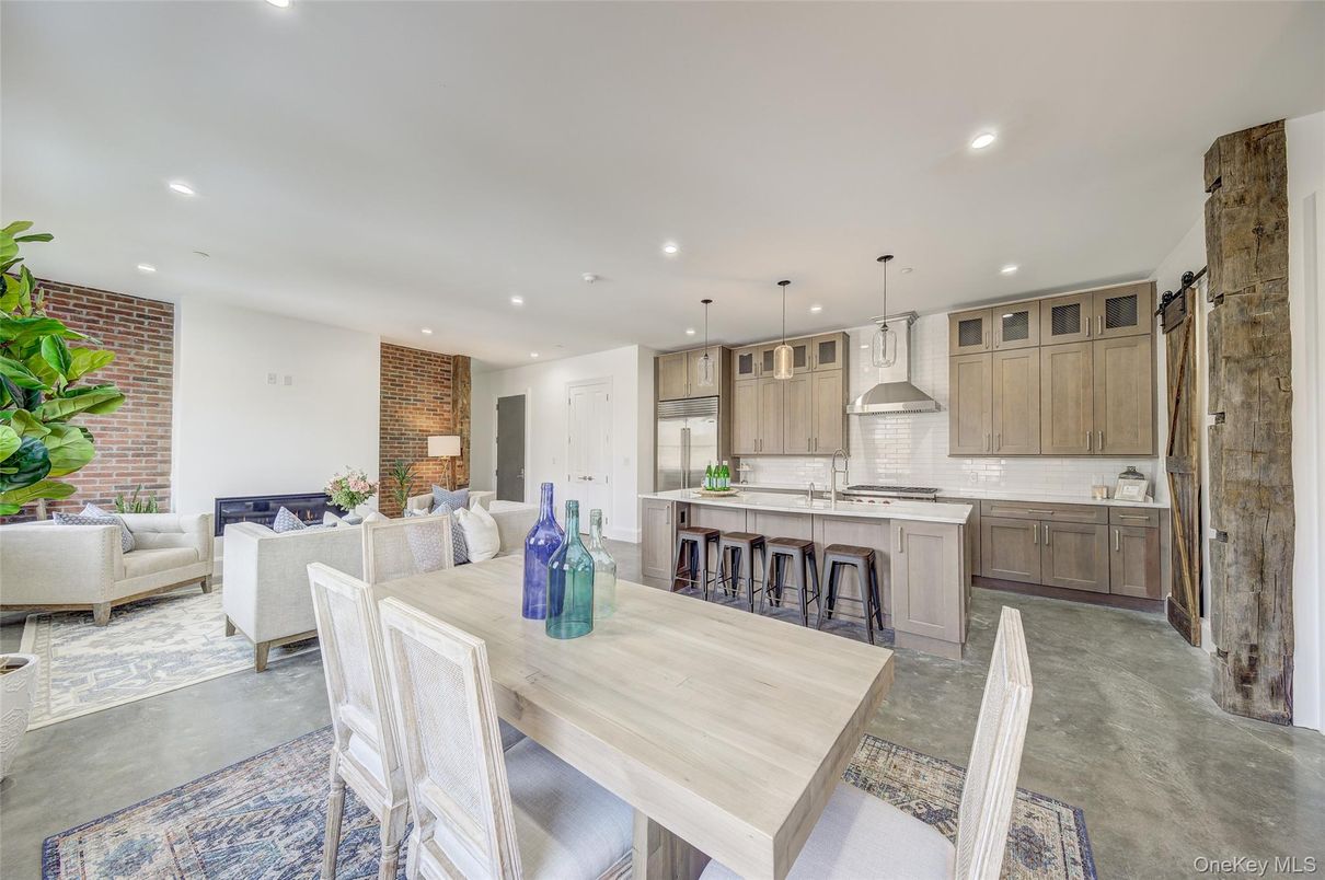 Dining room, Interior, Kitchen, Living room, Pendant Lights, Recessed Lighting, Stainless Steel Appliances, Stone Walls