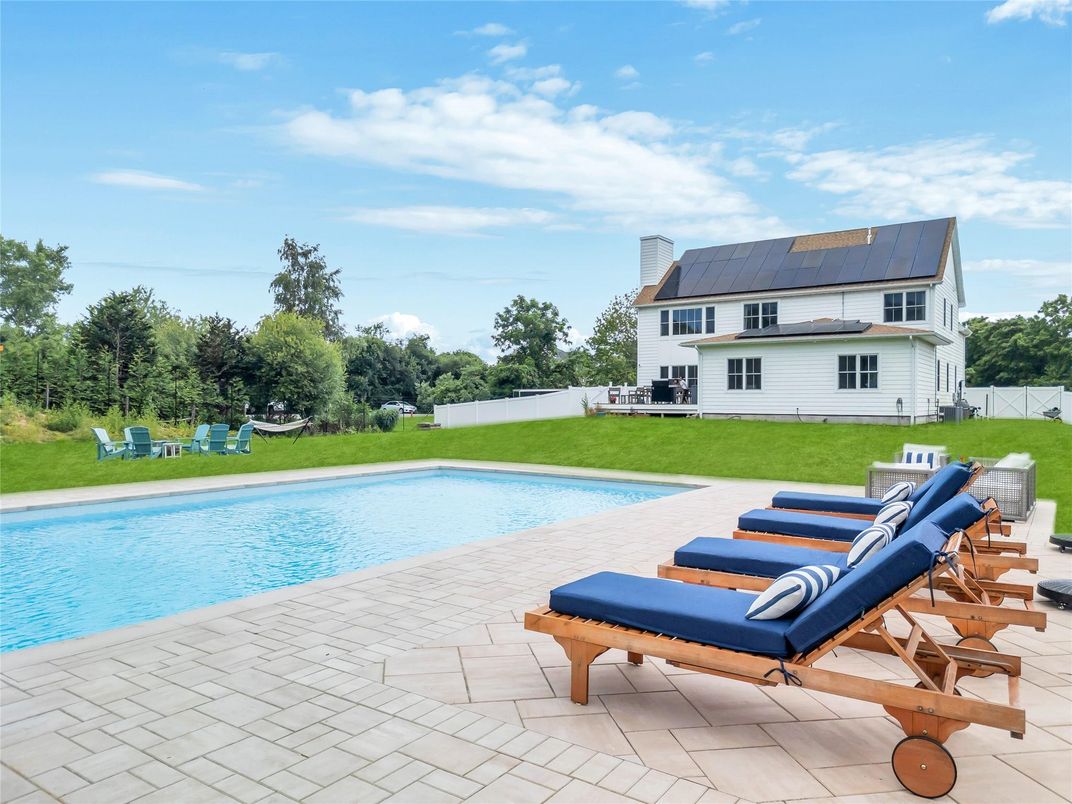 Exterior, Pool, Solar Panels