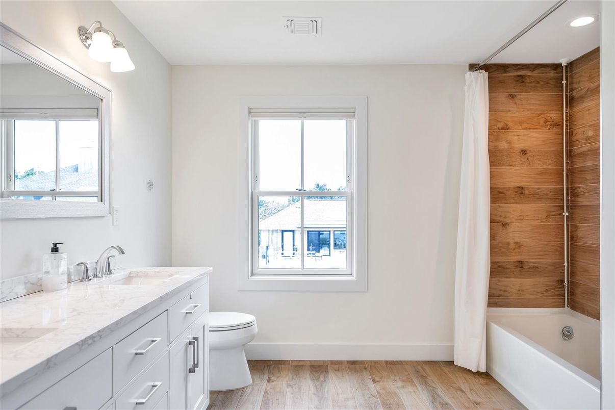 Bathroom, Dual Sink Vanities, Interior, Recessed Lighting, Wood Texture Flooring, Wooden Walls