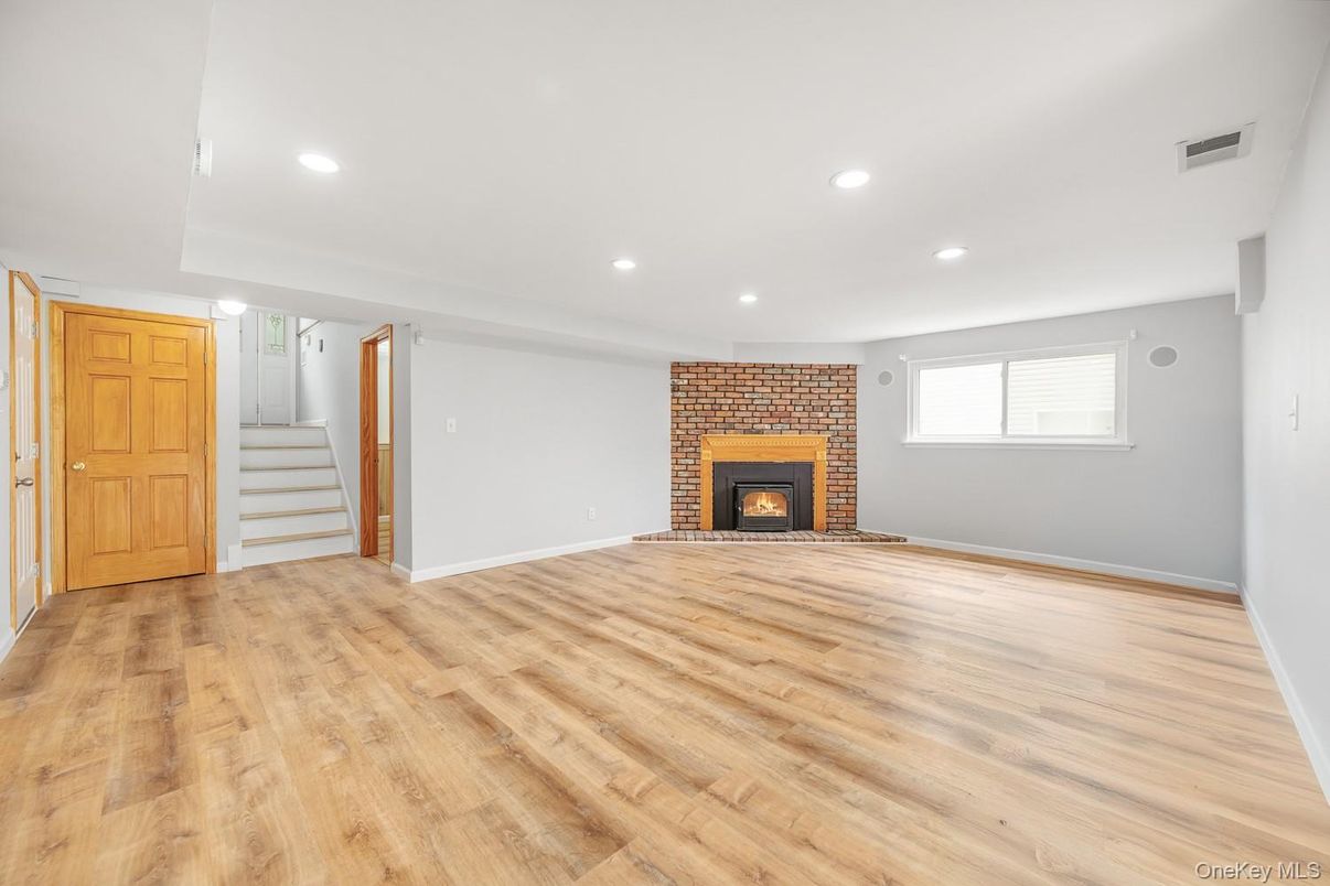 Empty room, Fireplace, Interior, Recessed Lighting, Wood Texture Flooring