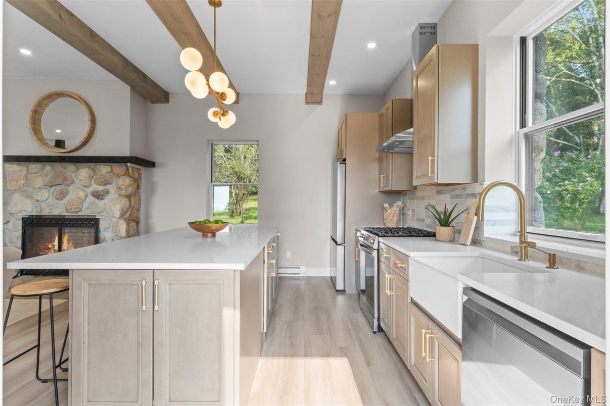 Fireplace, Interior, Kitchen, Pendant Lights, Recessed Lighting, Stainless Steel Appliances, Stone Walls, Wooden Beams, Wood Texture Flooring