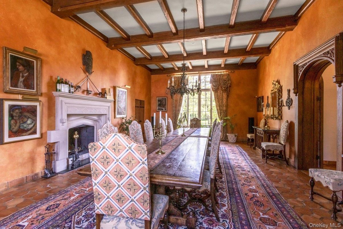 Chandelier, Dining room, Fireplace, Interior, Wooden Beams