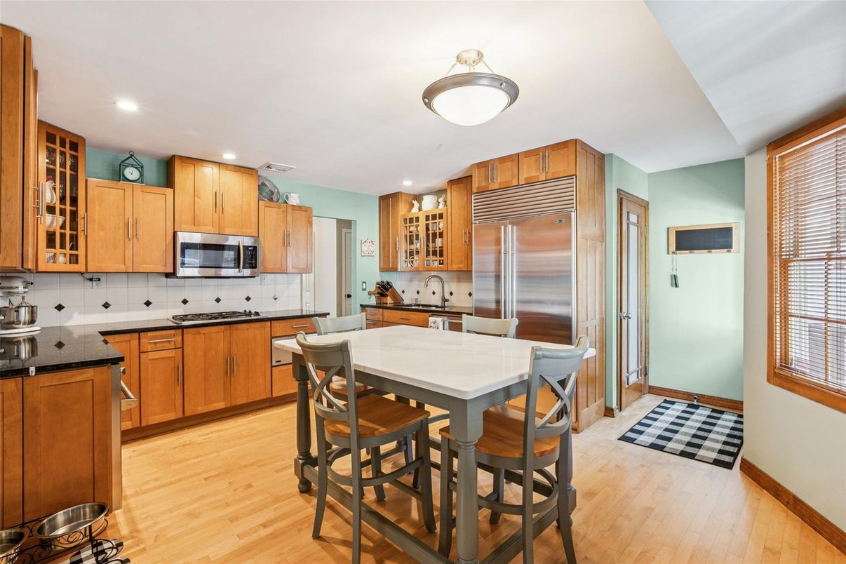Dining room, Interior, Kitchen, Recessed Lighting, Stainless Steel Appliances, Wood Texture Flooring