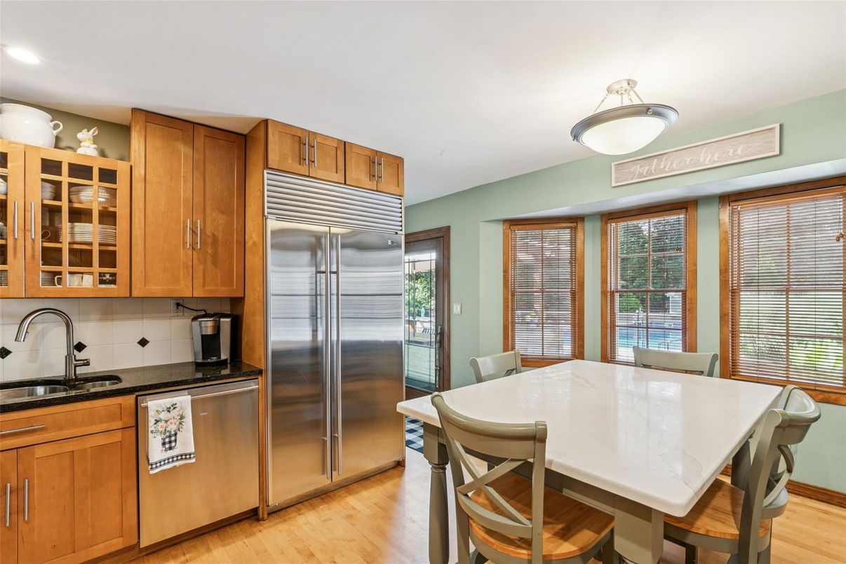 Dining room, Interior, Kitchen, Recessed Lighting, Stainless Steel Appliances, Wood Texture Flooring