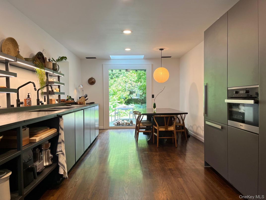 Dining room, Interior, Kitchen, Pendant Lights, Recessed Lighting, Stainless Steel Appliances, Wood Texture Flooring