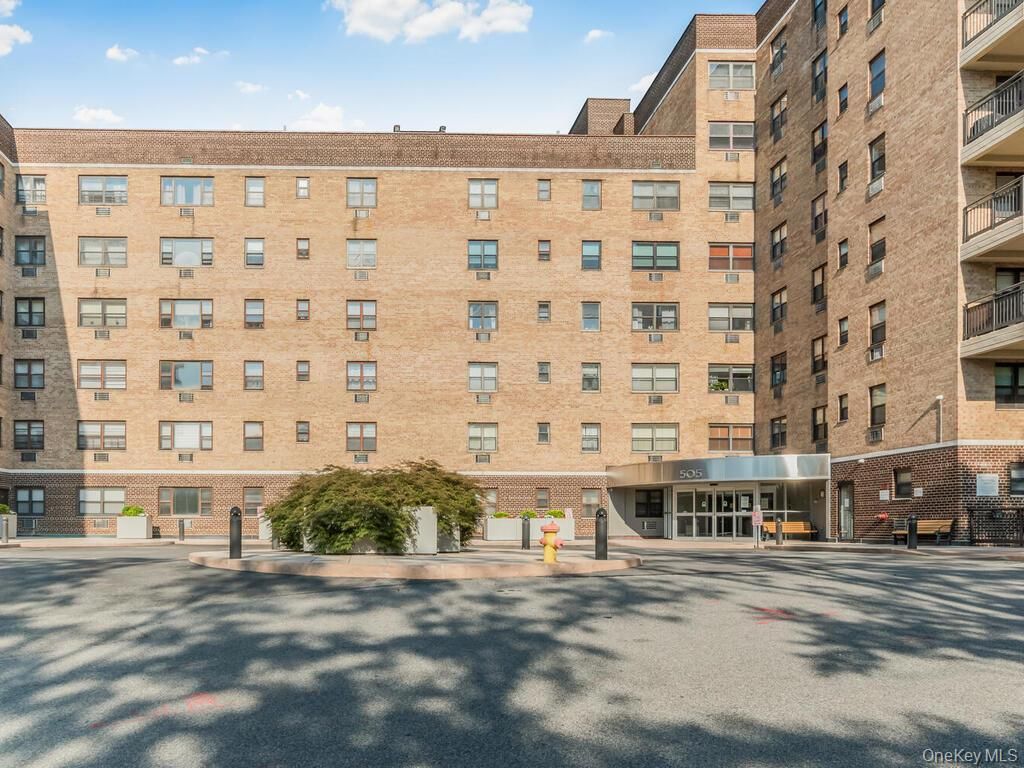 Exterior, Facade, Brick Facade, Condo Building