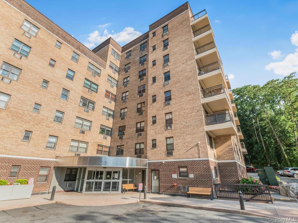 Exterior, Facade, Brick Facade, Condo Building