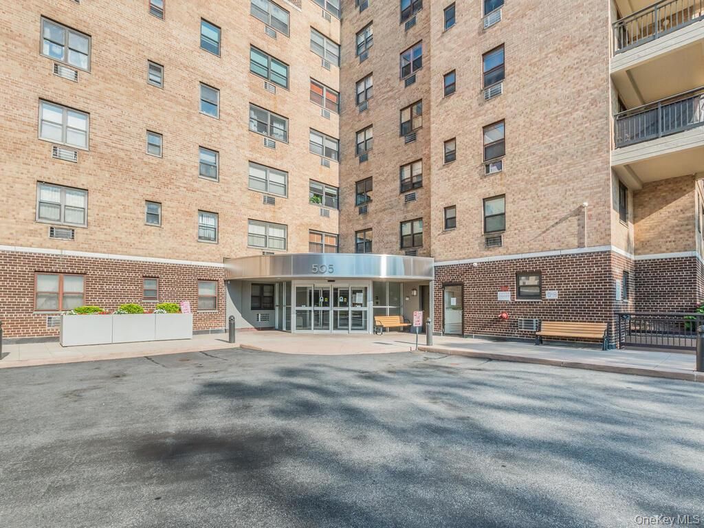 Exterior, Facade, Brick Facade, Condo Building