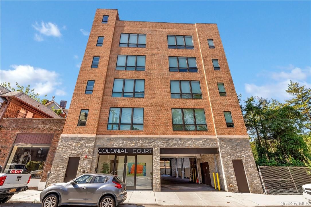 Exterior, Facade, Brick Facade, Condo Building