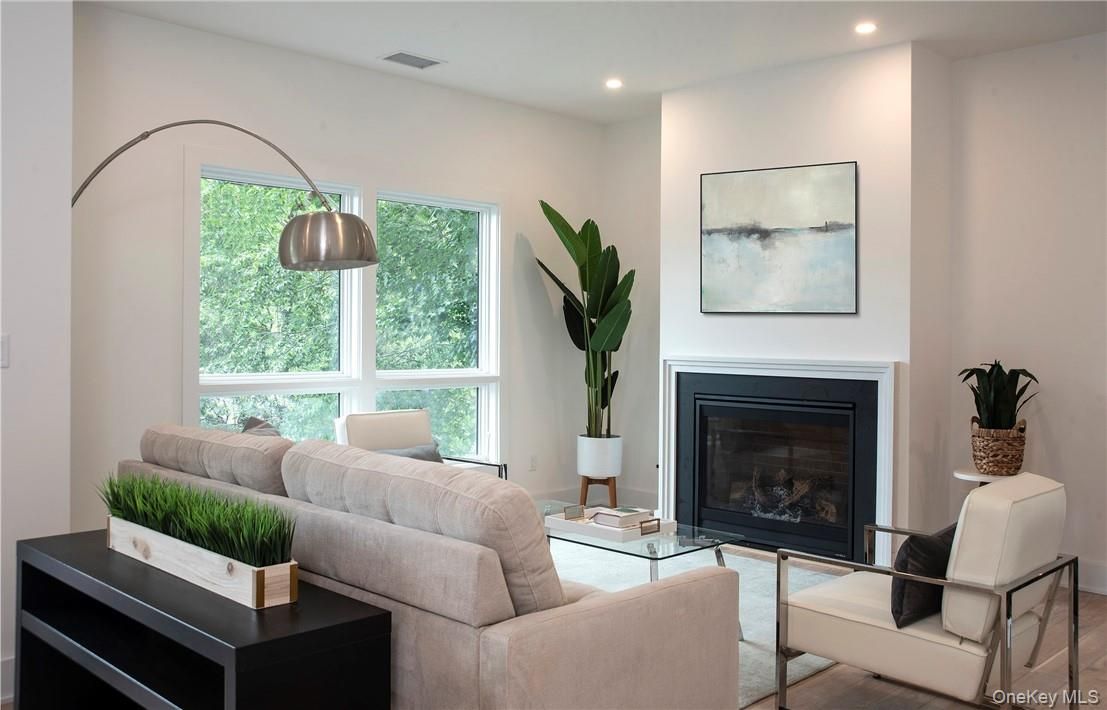 Fireplace, Interior, Living room, Recessed Lighting, Wood Texture Flooring