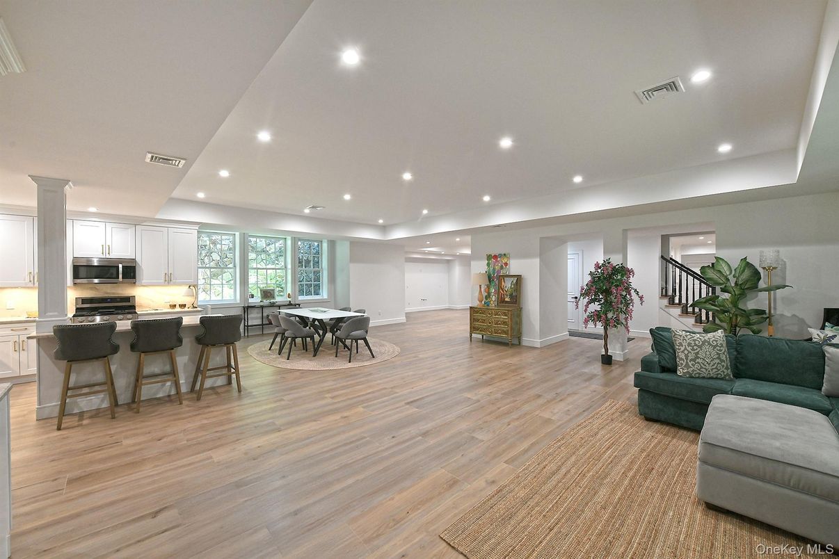 Dining room, Interior, Kitchen, Living room, Recessed Lighting, Stainless Steel Appliances, Wood Texture Flooring